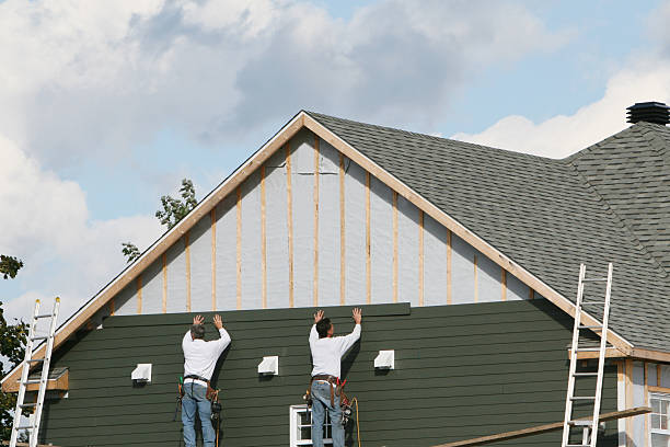 Professional Siding Installation technician working in Nashport, OH